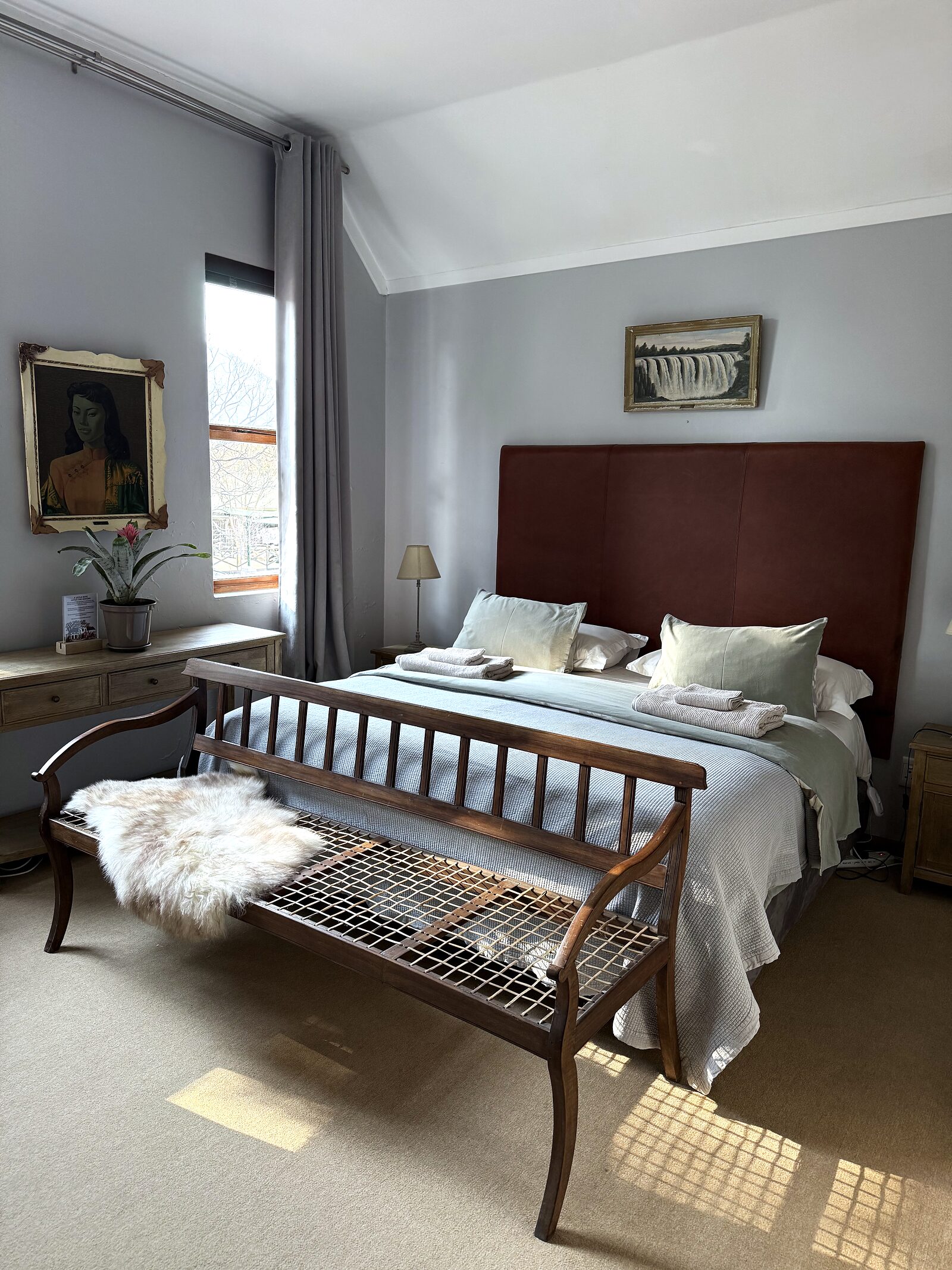 The main bedroom in The Loft, made up with fresh linen