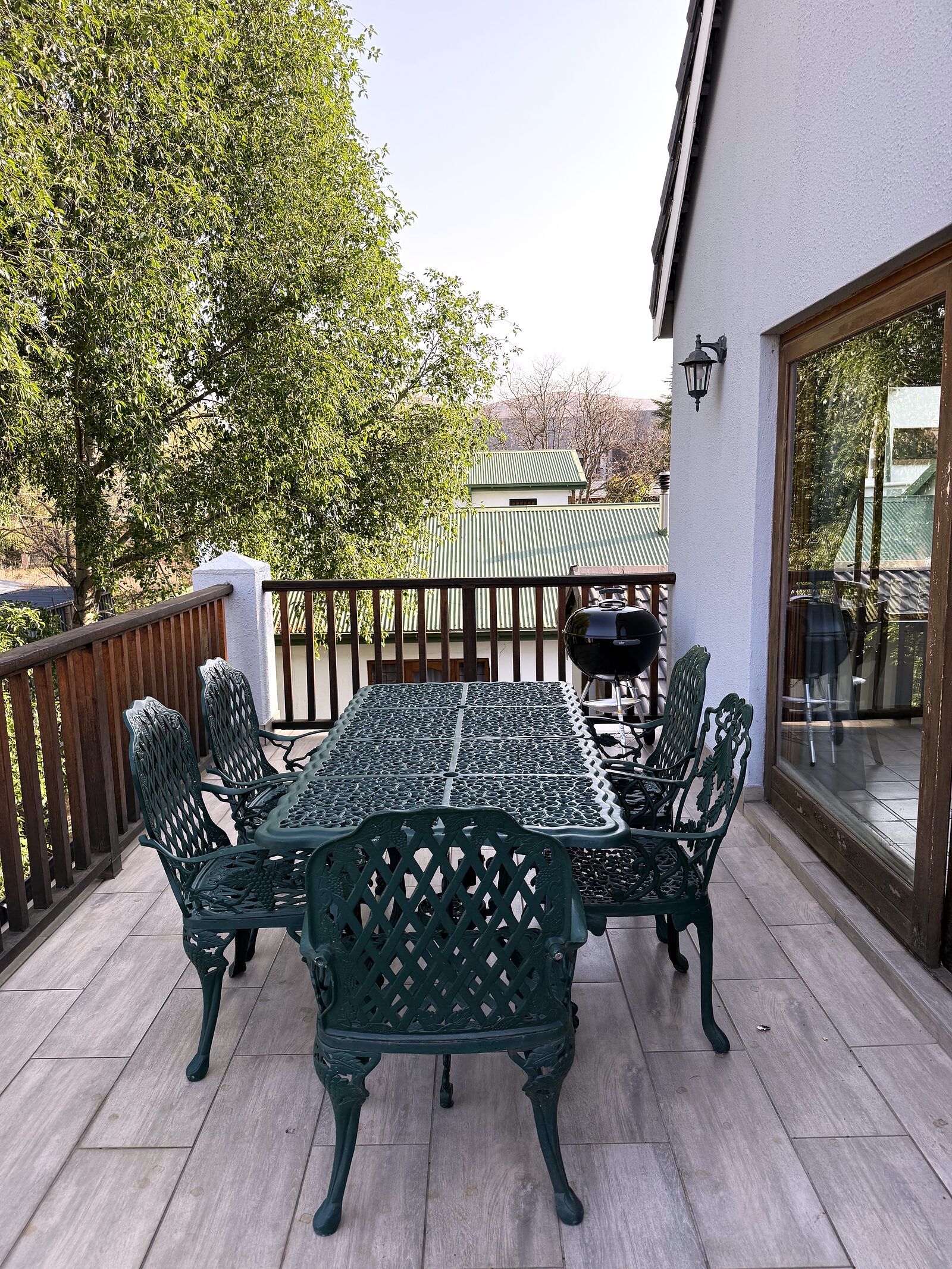 Table set on The Loft patio with the mountains beyond