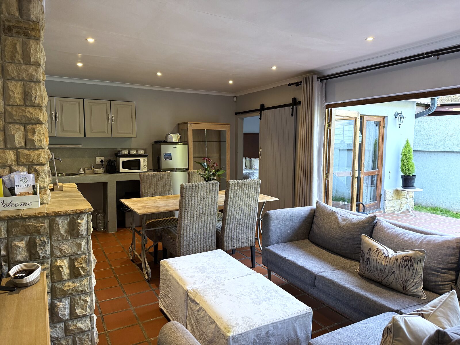 Kitchen in The Studio beside the sandstone column