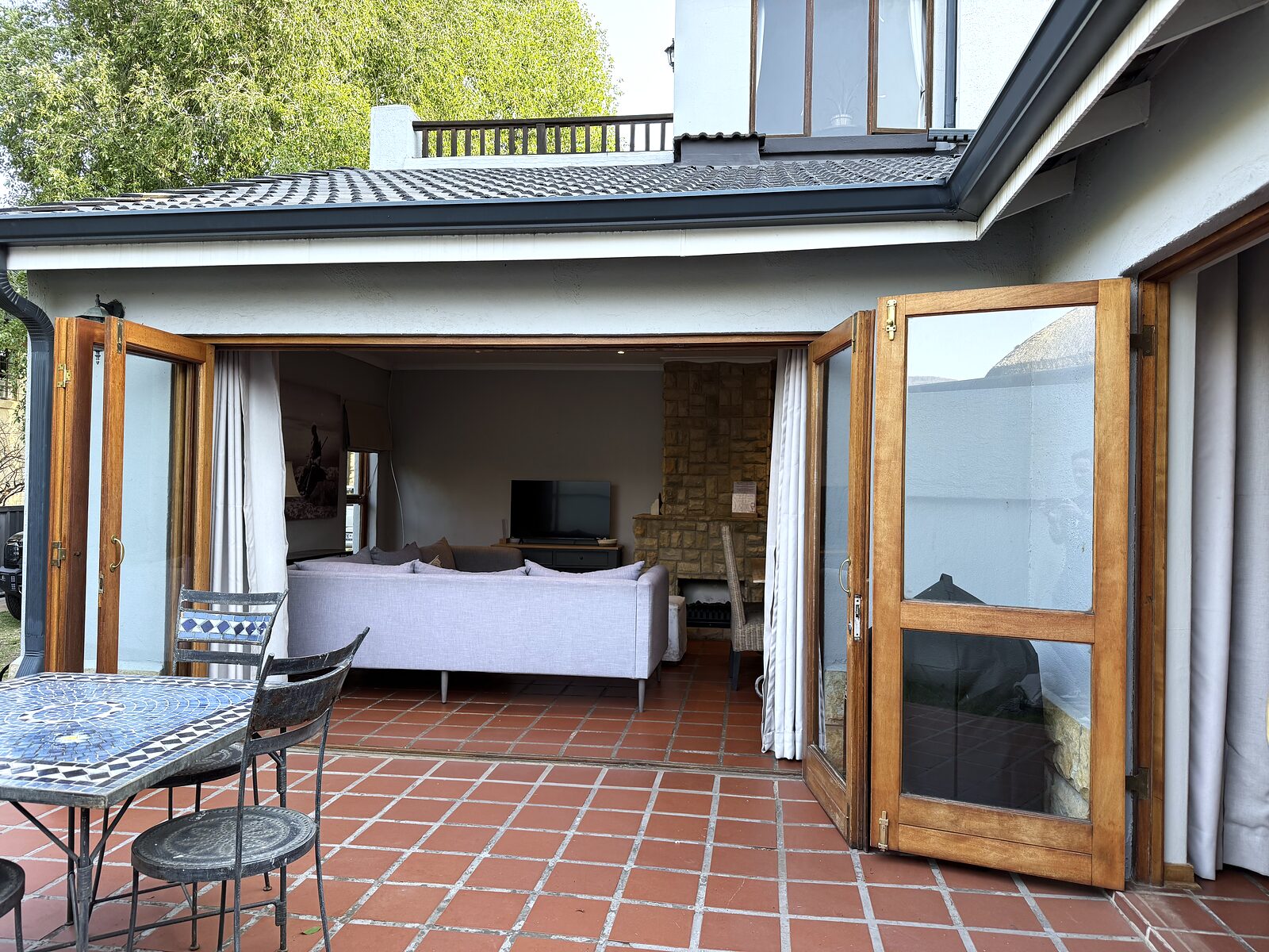 The Studio patio with the stack doors folded fully open